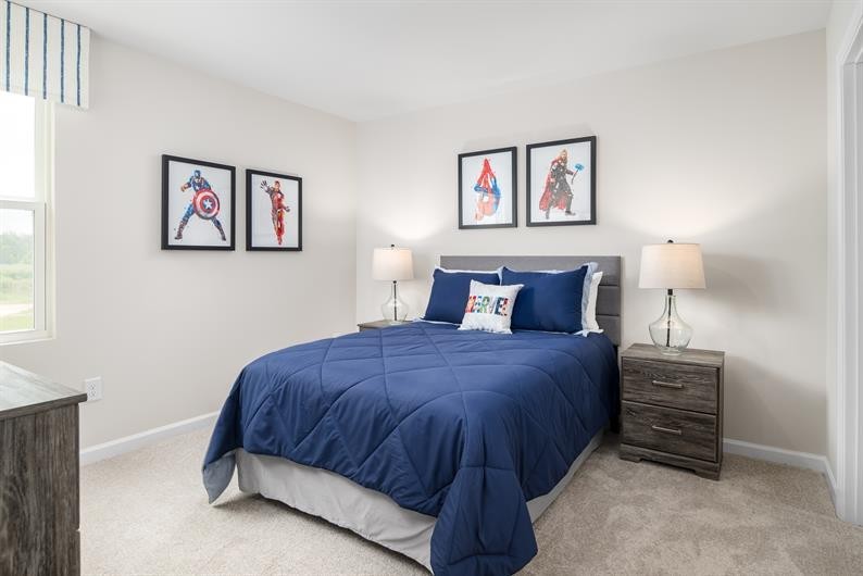 627 Merle Avenue Franklin, KY 42134 - Photo 14 of 19 a bedroom with a bed and a painting on the wall
