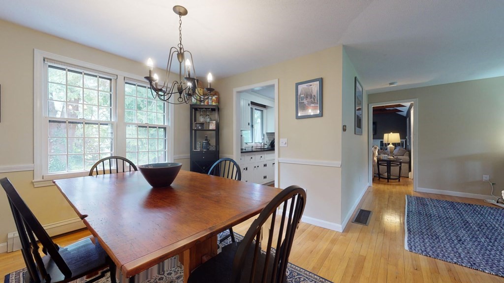 290 Riverview Lane Barnstable, MA 02632 - Photo 13 of 31 a view of a dining room with furniture window and wooden floor
