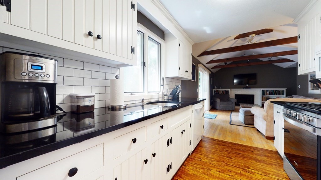 290 Riverview Lane Barnstable, MA 02632 - Photo 22 of 31 a kitchen with granite countertop a sink stainless steel appliances and cabinets