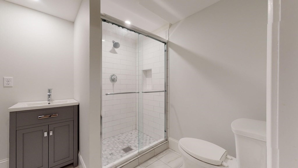 290 Riverview Lane Barnstable, MA 02632 - Photo 9 of 31 a bathroom with a shower a toilet and sink