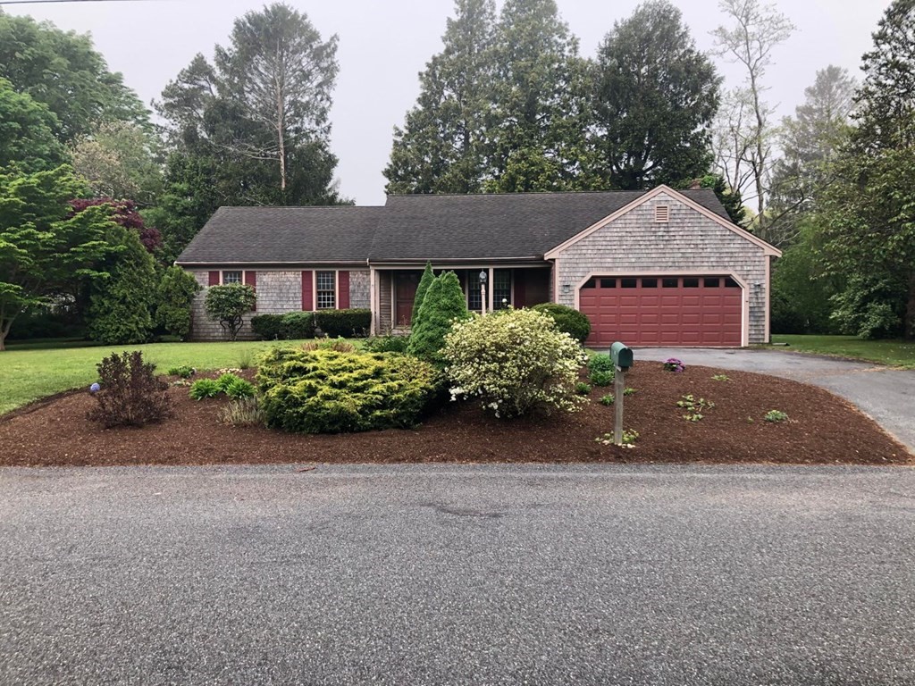 290 Riverview Lane Barnstable, MA 02632 - Photo 10 of 31 front view of a house with a street