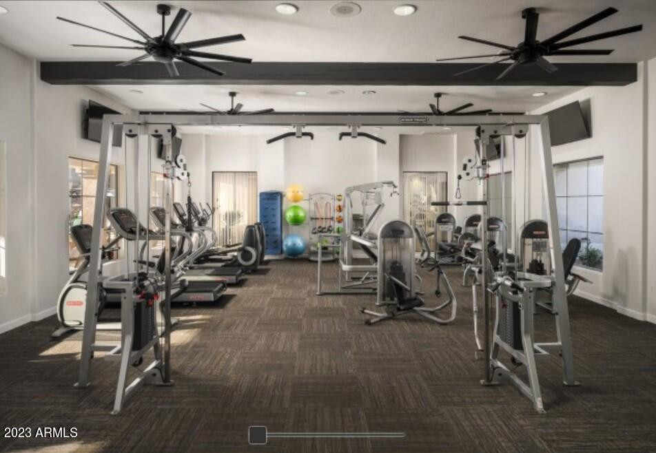 2910 South Greenfield Road, Unit B3B Gilbert, AZ 85295 - Photo 9 of 13 a view of a room with gym equipment