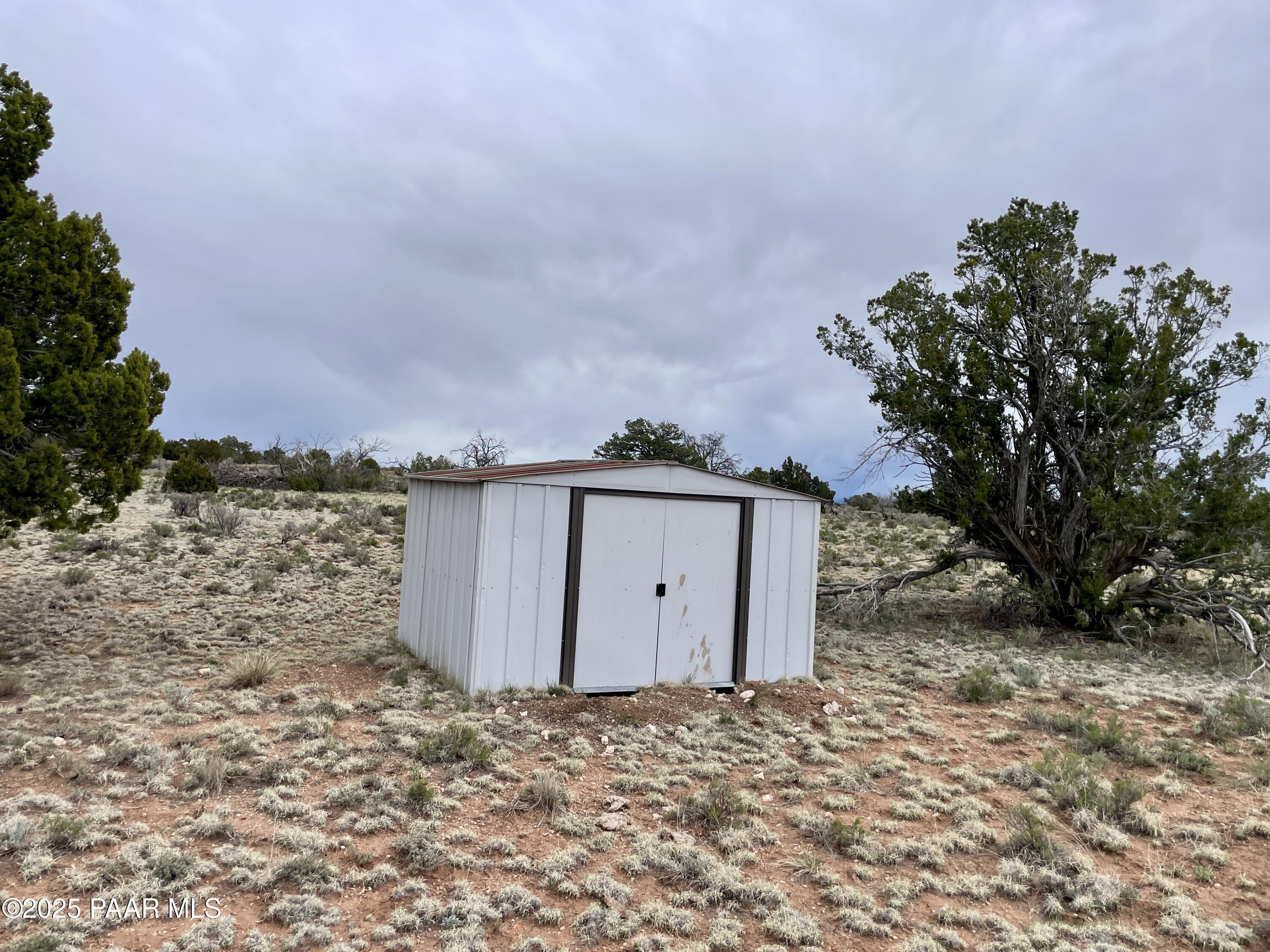 3998 Red Butte Road Williams, AZ 86046 - Photo 9 of 20 a view of a house with a dry yard