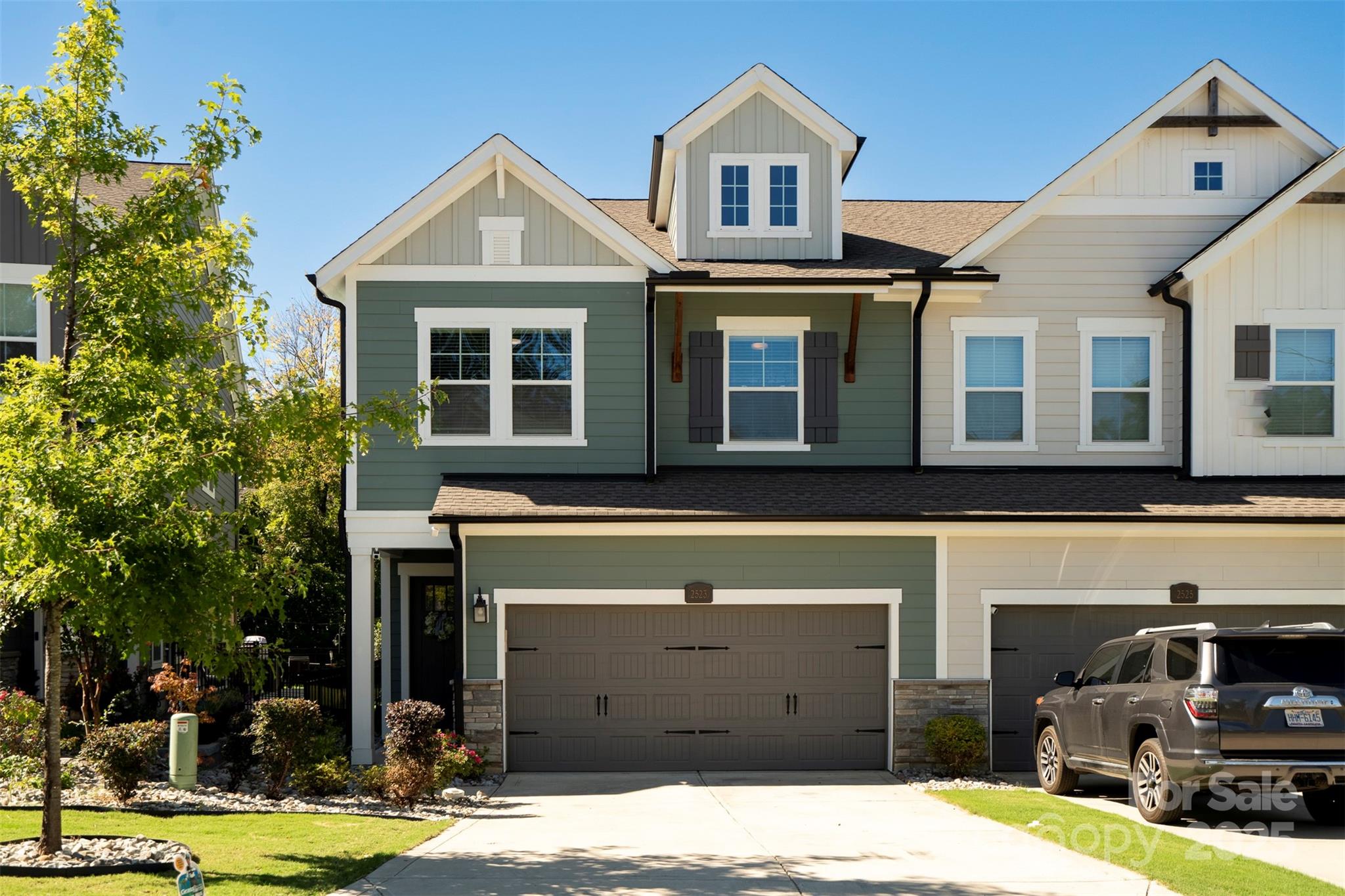 2523 Lola Avenue Charlotte, NC 28205 - Photo 2 of 40 a front view of a house with a yard