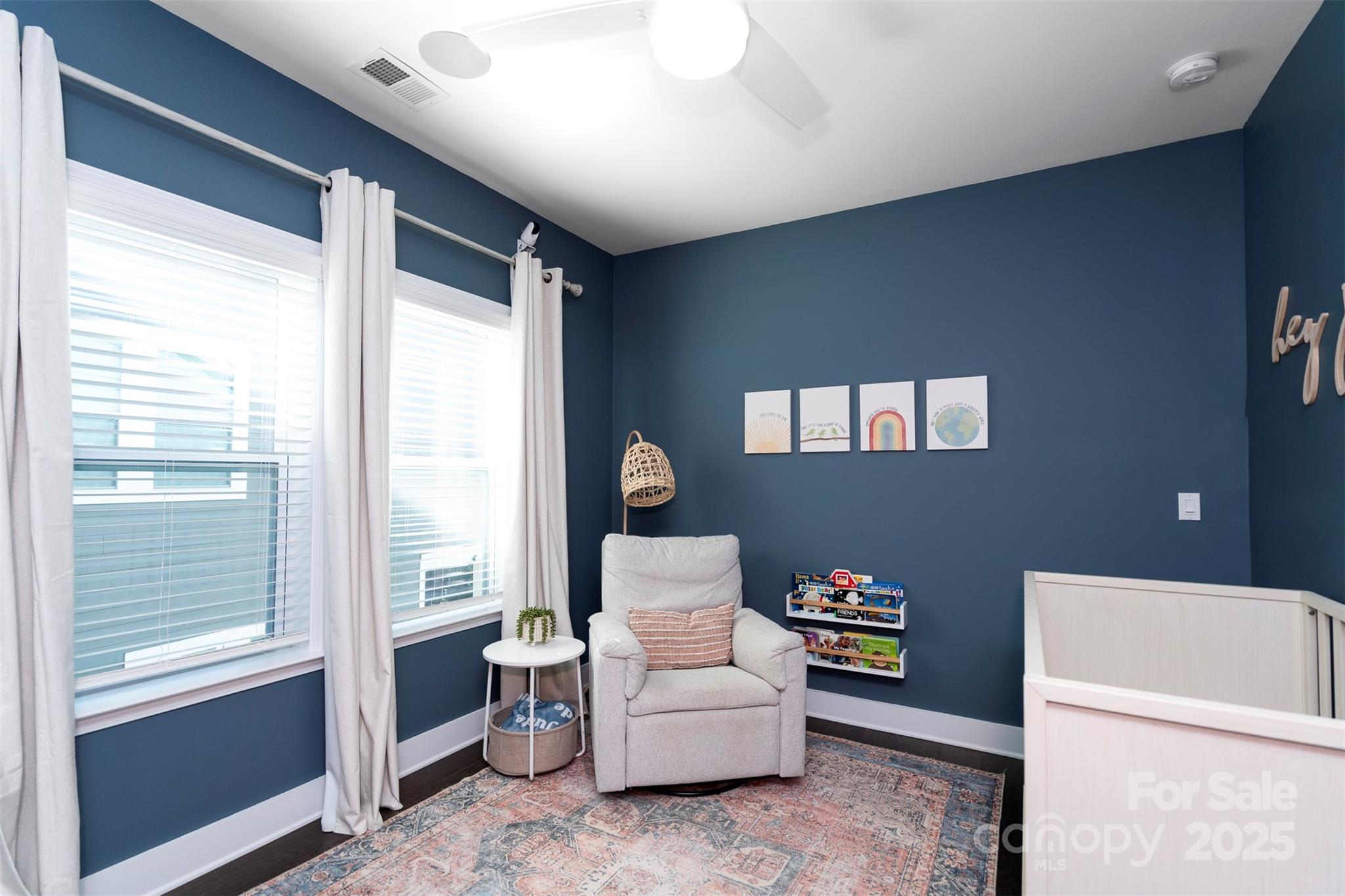 2523 Lola Avenue Charlotte, NC 28205 - Photo 24 of 40 a living room with furniture and a window