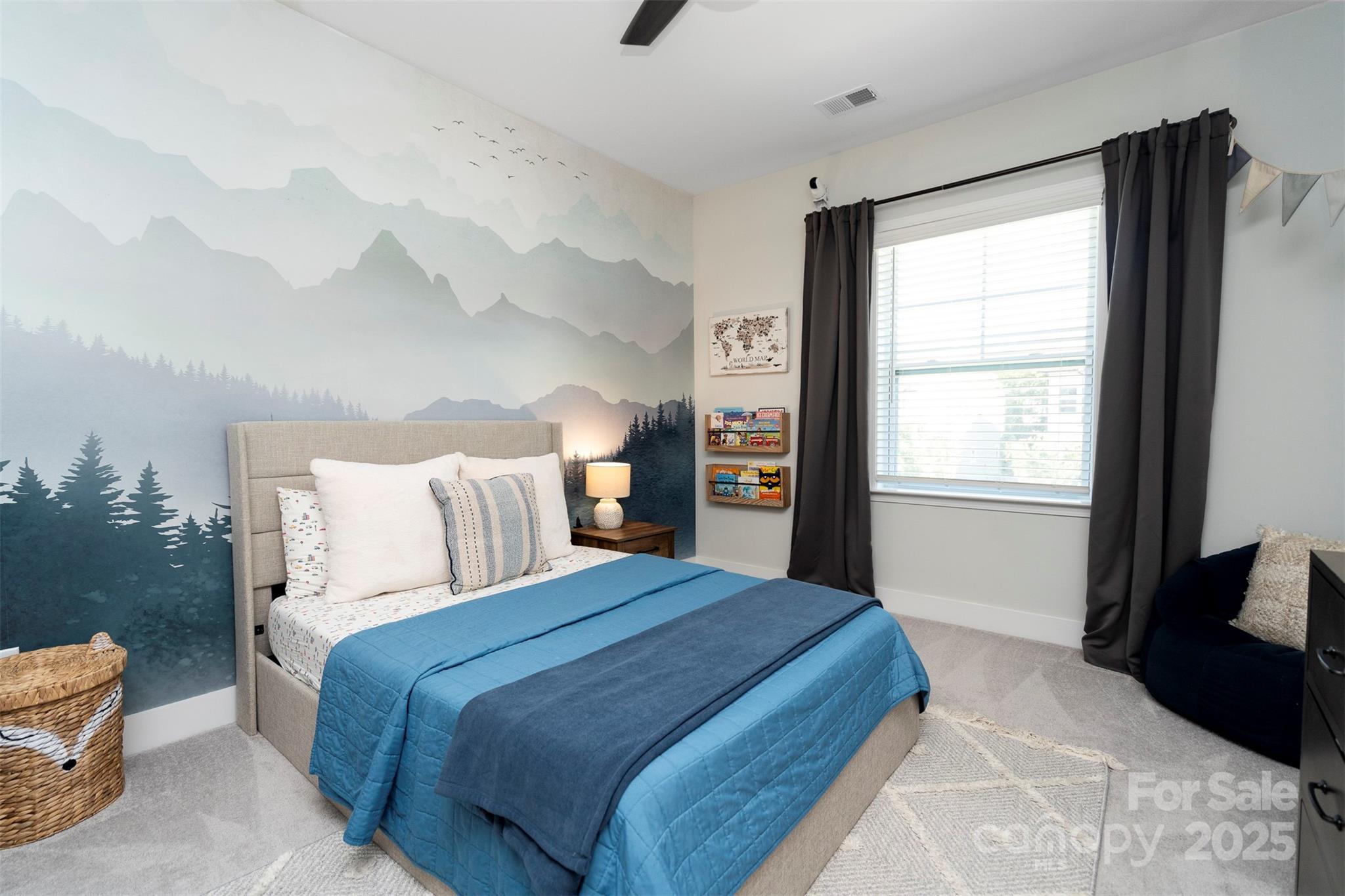 2523 Lola Avenue Charlotte, NC 28205 - Photo 25 of 40 a bedroom with a large bed and a window