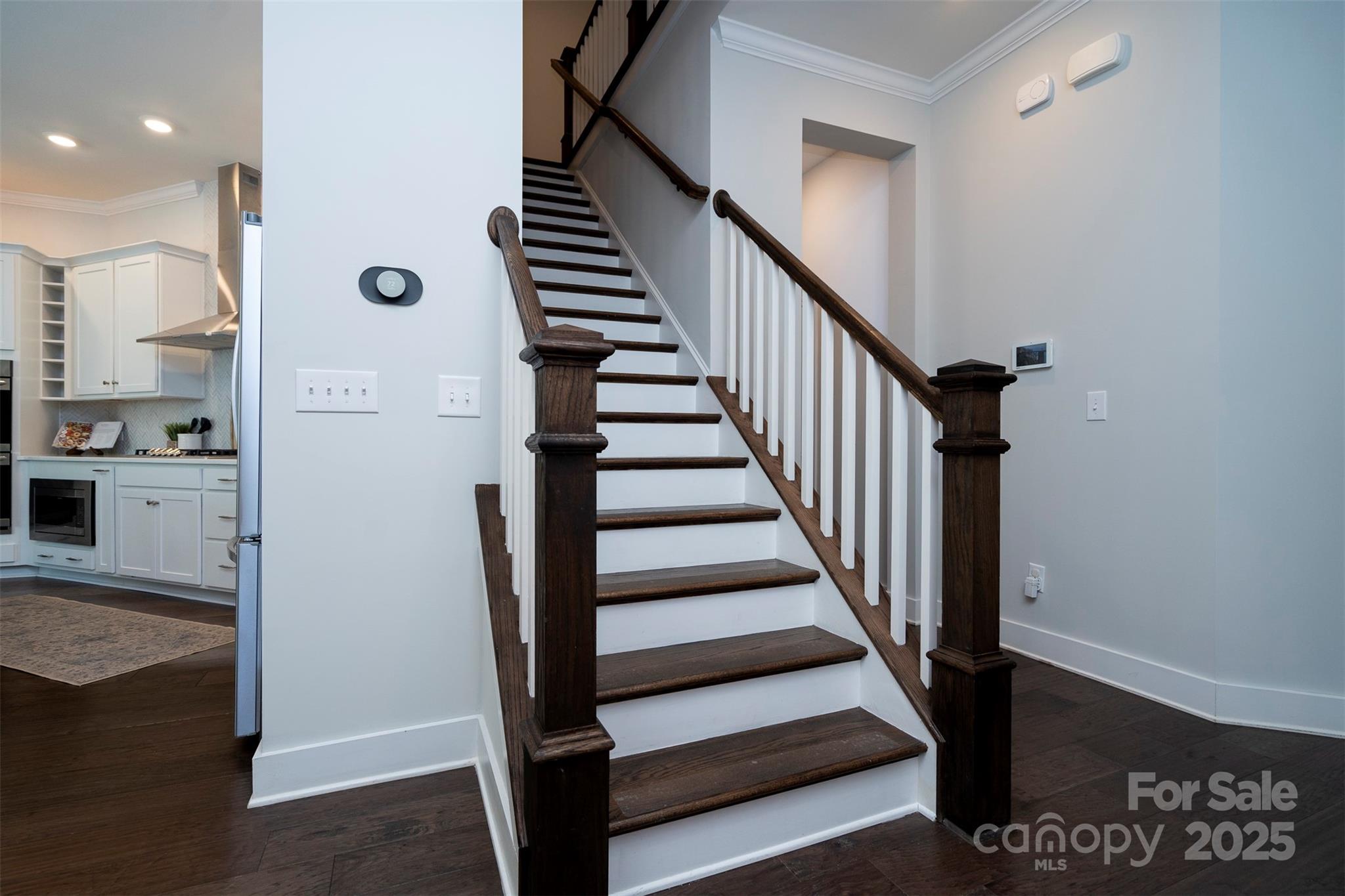 2523 Lola Avenue Charlotte, NC 28205 - Photo 4 of 40 a view of entryway and hall with wooden floor