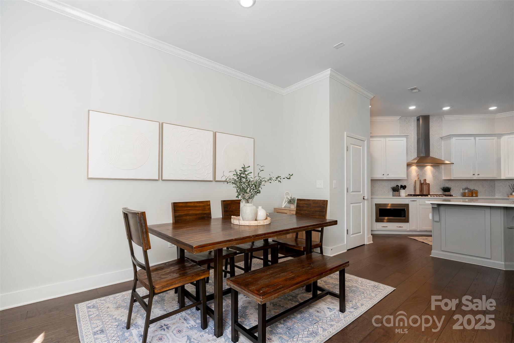 2523 Lola Avenue Charlotte, NC 28205 - Photo 8 of 40 a dining room with furniture and wooden floor