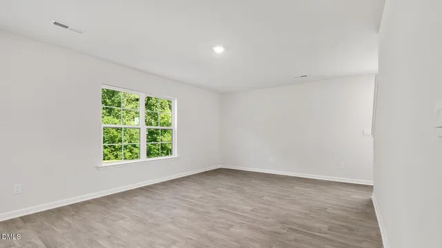 an empty room with a window