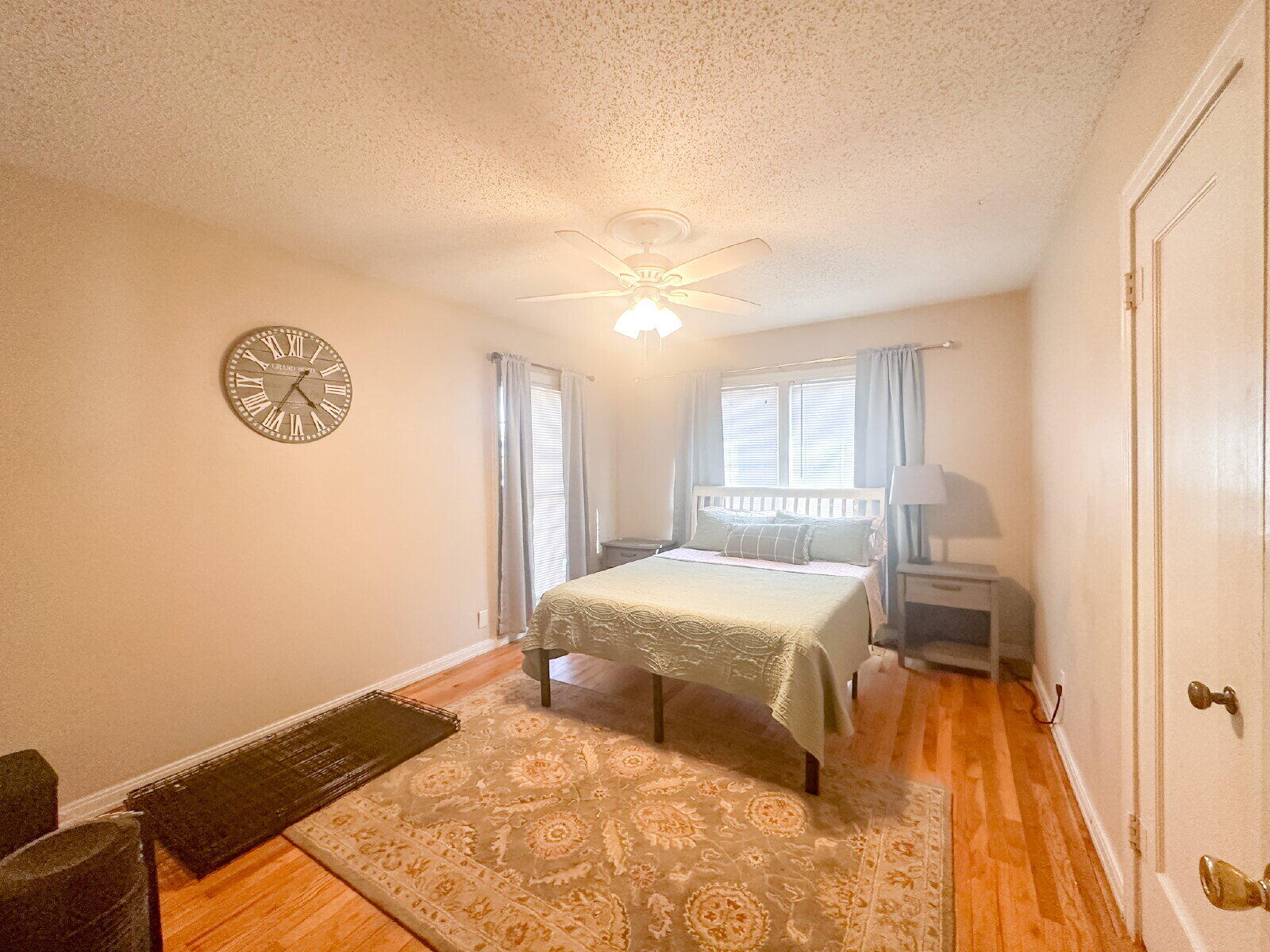 2611 29th Street Lubbock, TX 79410 - Photo 6 of 9 a bedroom with a bed and a window