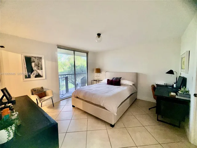 a view of house with swimming pool outdoor seating