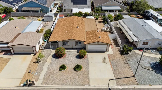 a view of a city with mountains in the background
