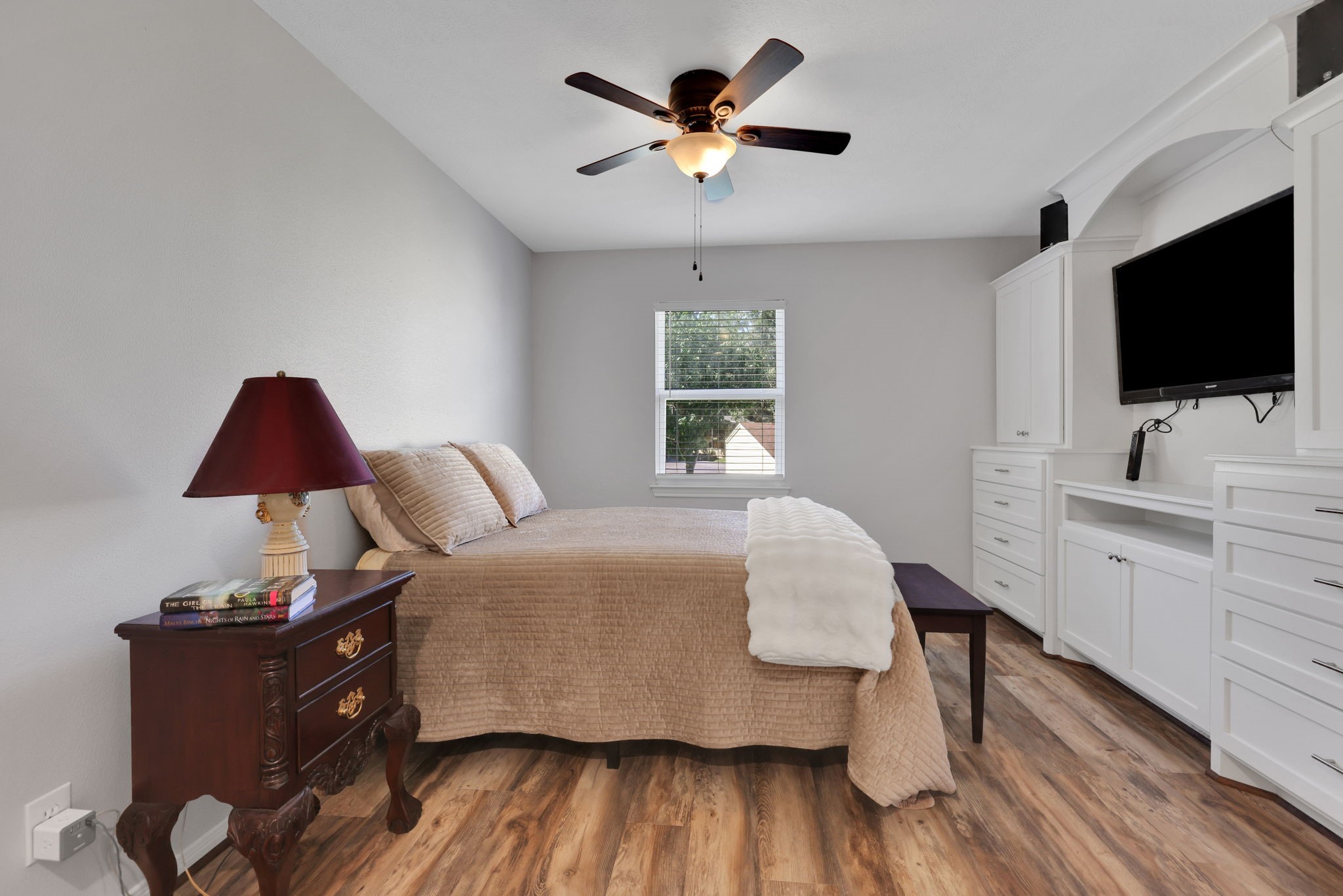 20 Ridgeway Drive Coldspring, TX 77331 - Photo 12 of 40 a bedroom with a bed and a flat screen tv