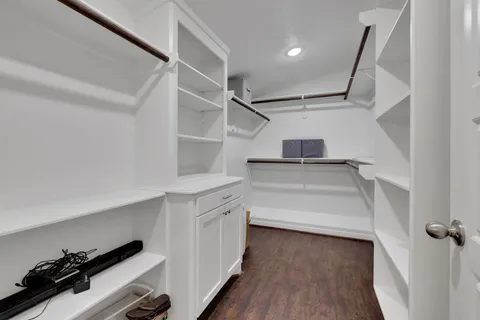 a view of a storage & utility room with wooden floor