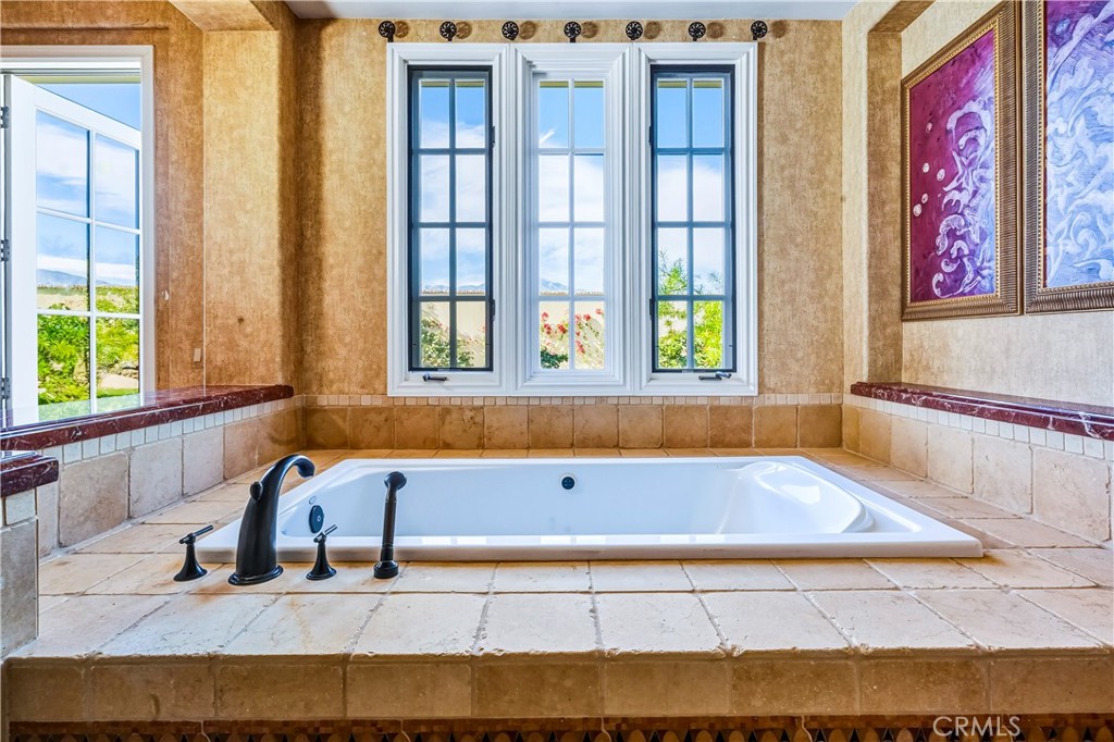 13 Cassis Circle Rancho Mirage, CA 92270 - Photo 22 of 51 a living room with natural light