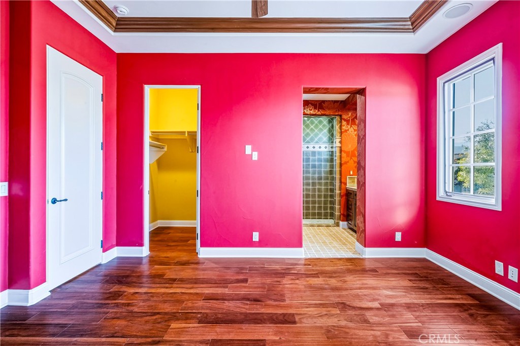 13 Cassis Circle Rancho Mirage, CA 92270 - Photo 24 of 51 a view of a living room with red walls