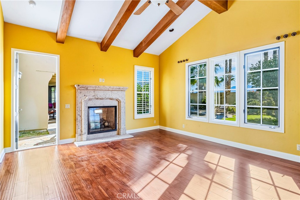 13 Cassis Circle Rancho Mirage, CA 92270 - Photo 27 of 70 a view of an empty room with window and a fireplace