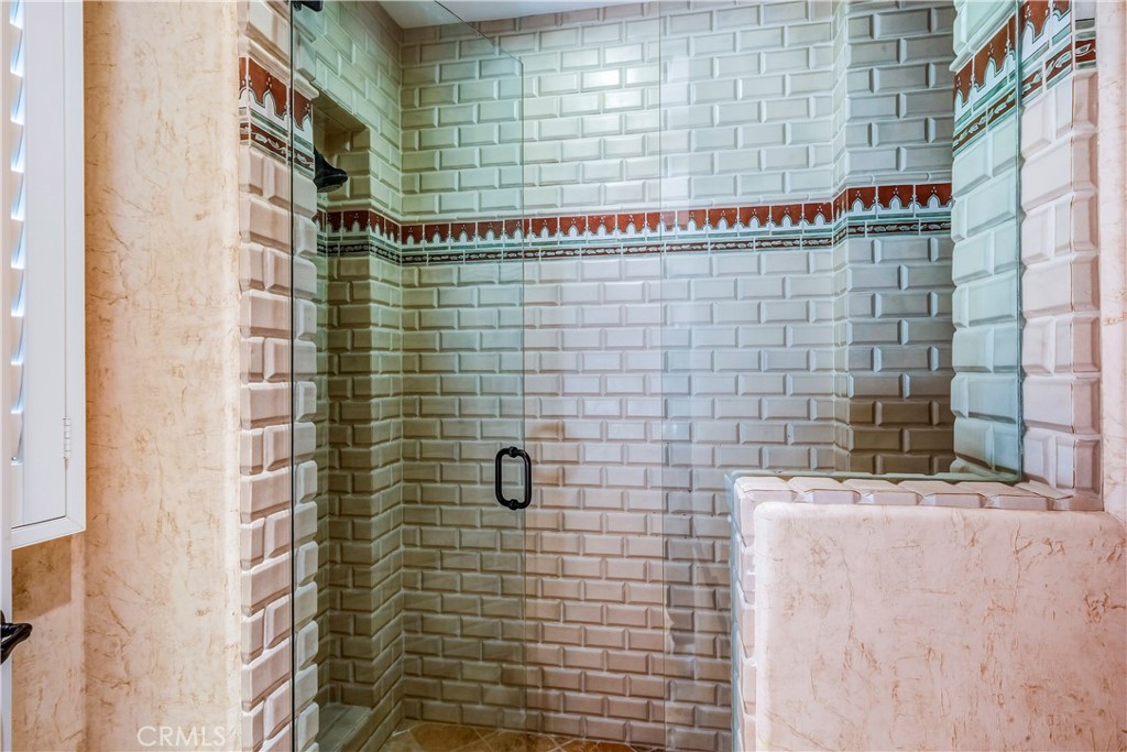 13 Cassis Circle Rancho Mirage, CA 92270 - Photo 34 of 51 a bathroom with a shower