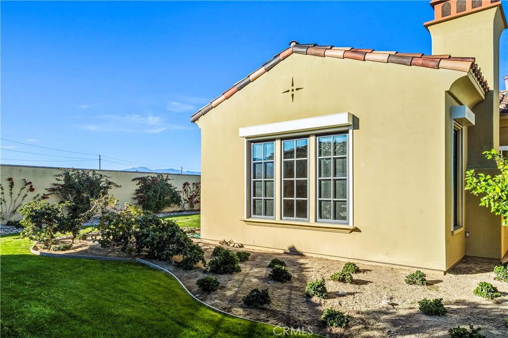 13 Cassis Circle Rancho Mirage, CA 92270 - Photo 41 of 51 a view of a house with a backyard