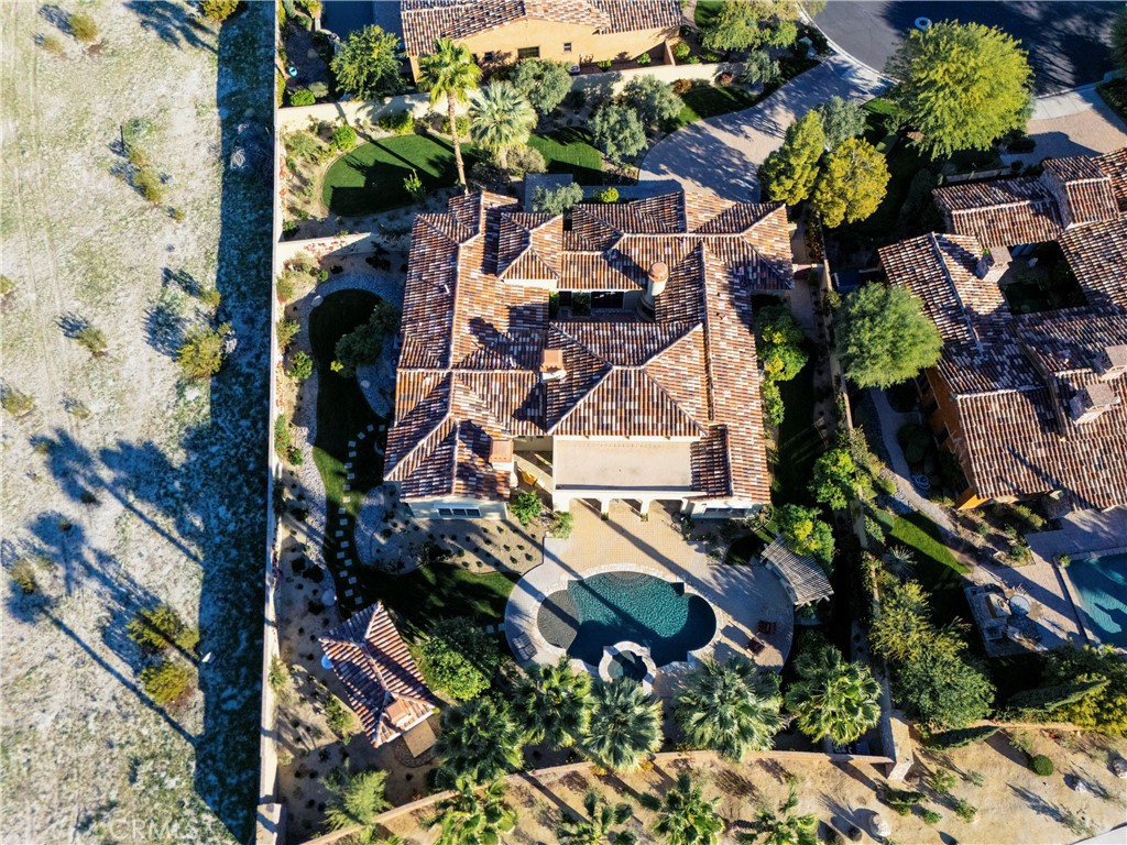 13 Cassis Circle Rancho Mirage, CA 92270 - Photo 49 of 51 an aerial view of residential houses with outdoor space