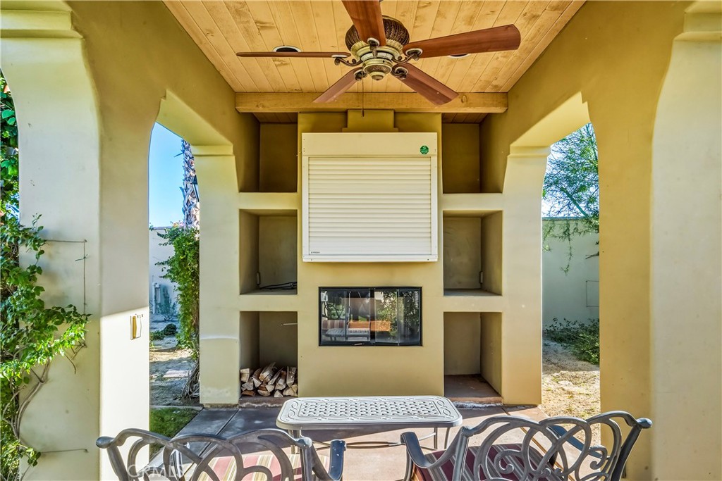 13 Cassis Circle Rancho Mirage, CA 92270 - Photo 58 of 70 Loggia with Fireplace