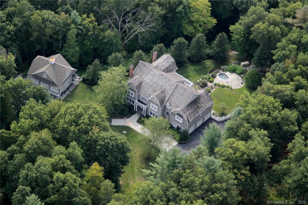 112 Old Branchville Road Ridgefield, CT 06877 - Photo 1 of 1 an aerial view of a house with a yard basket ball court and outdoor seating
