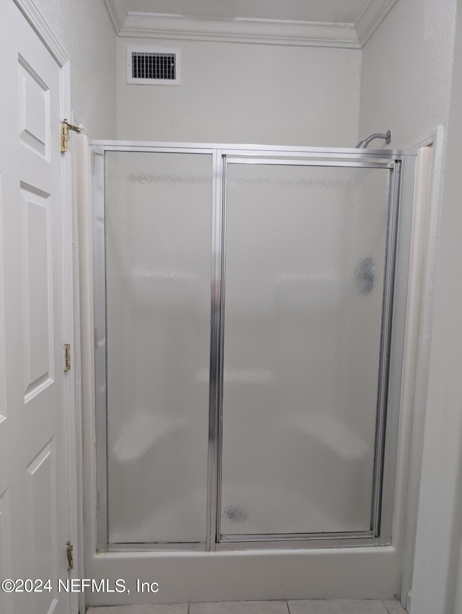 114 Cedar Street, Unit 8 St. Augustine, FL 32084 - Photo 11 of 39 a bathroom with a shower