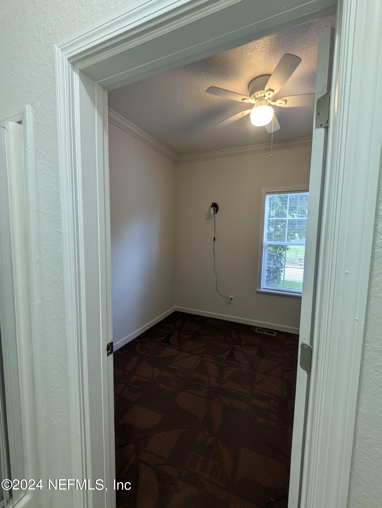 114 Cedar Street, Unit 8 St. Augustine, FL 32084 - Photo 14 of 39 a view of an empty room
