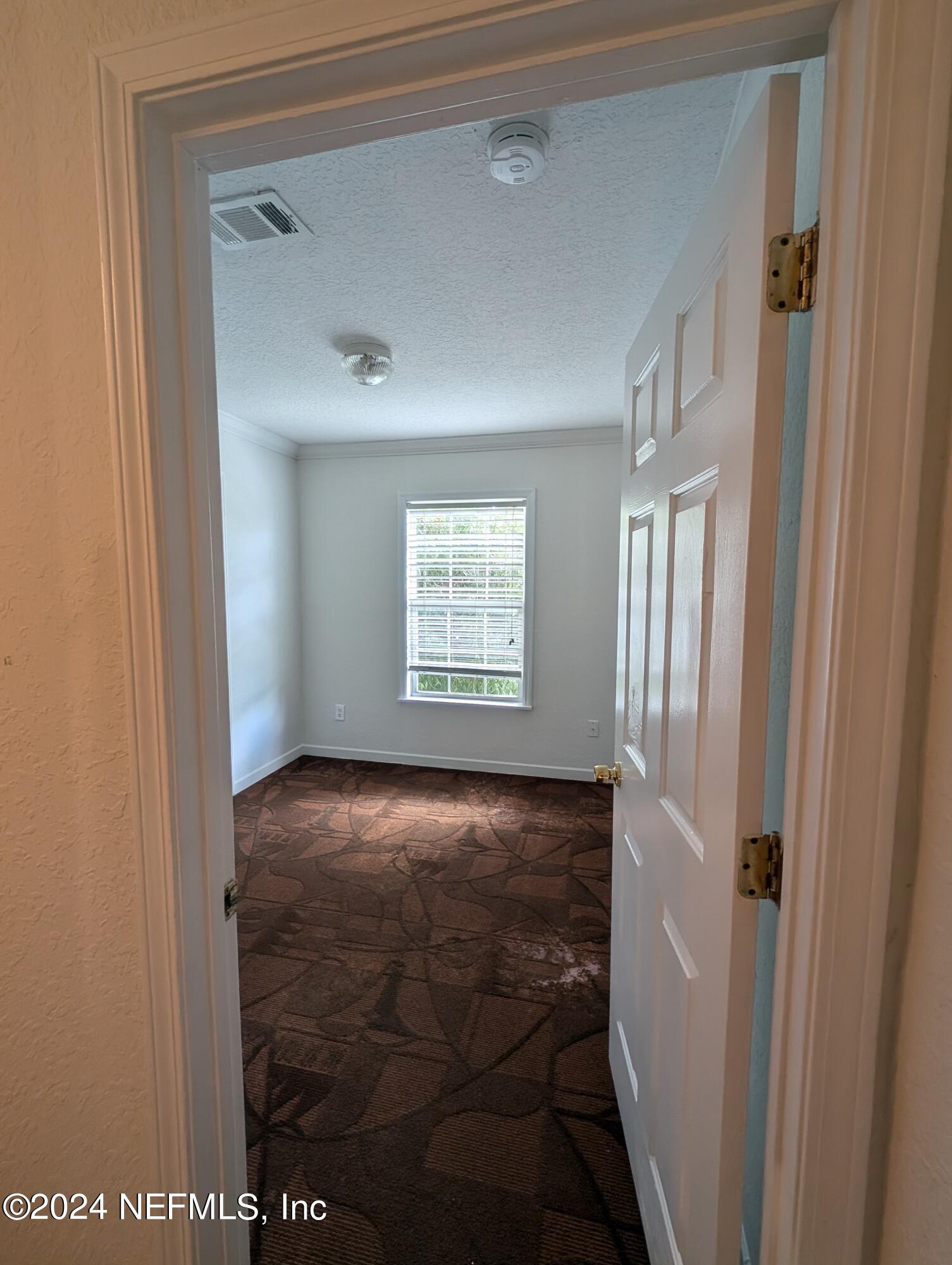 114 Cedar Street, Unit 8 St. Augustine, FL 32084 - Photo 20 of 39 a view of an empty room
