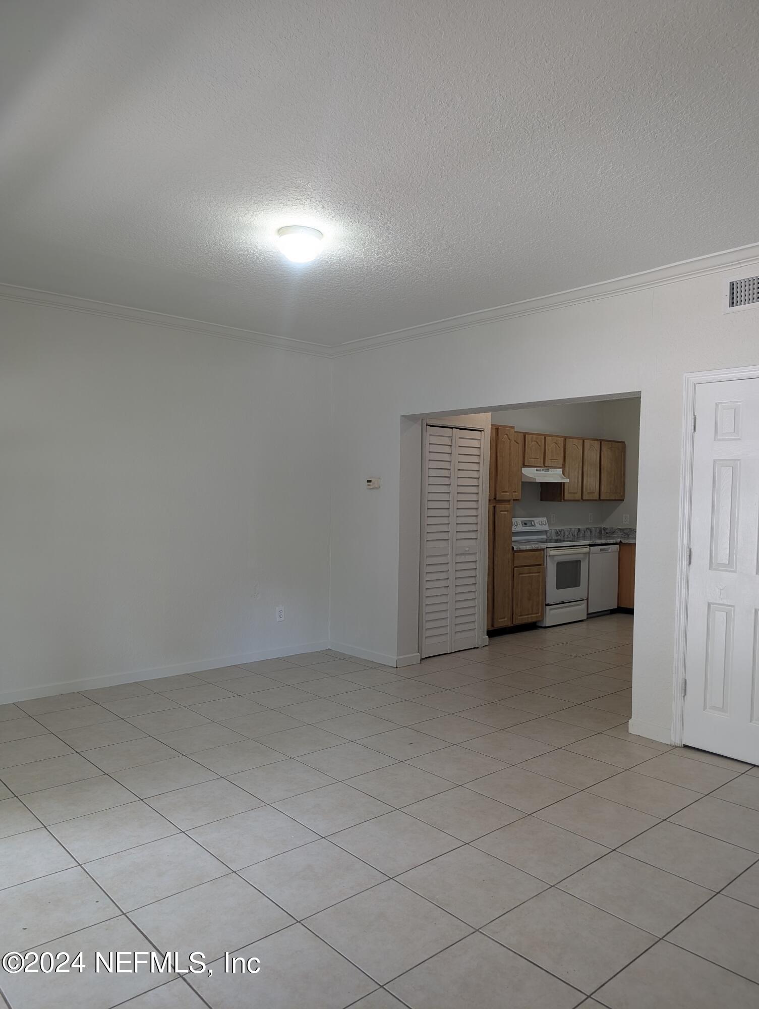 114 Cedar Street, Unit 8 St. Augustine, FL 32084 - Photo 2 of 39 an empty room with an empty space