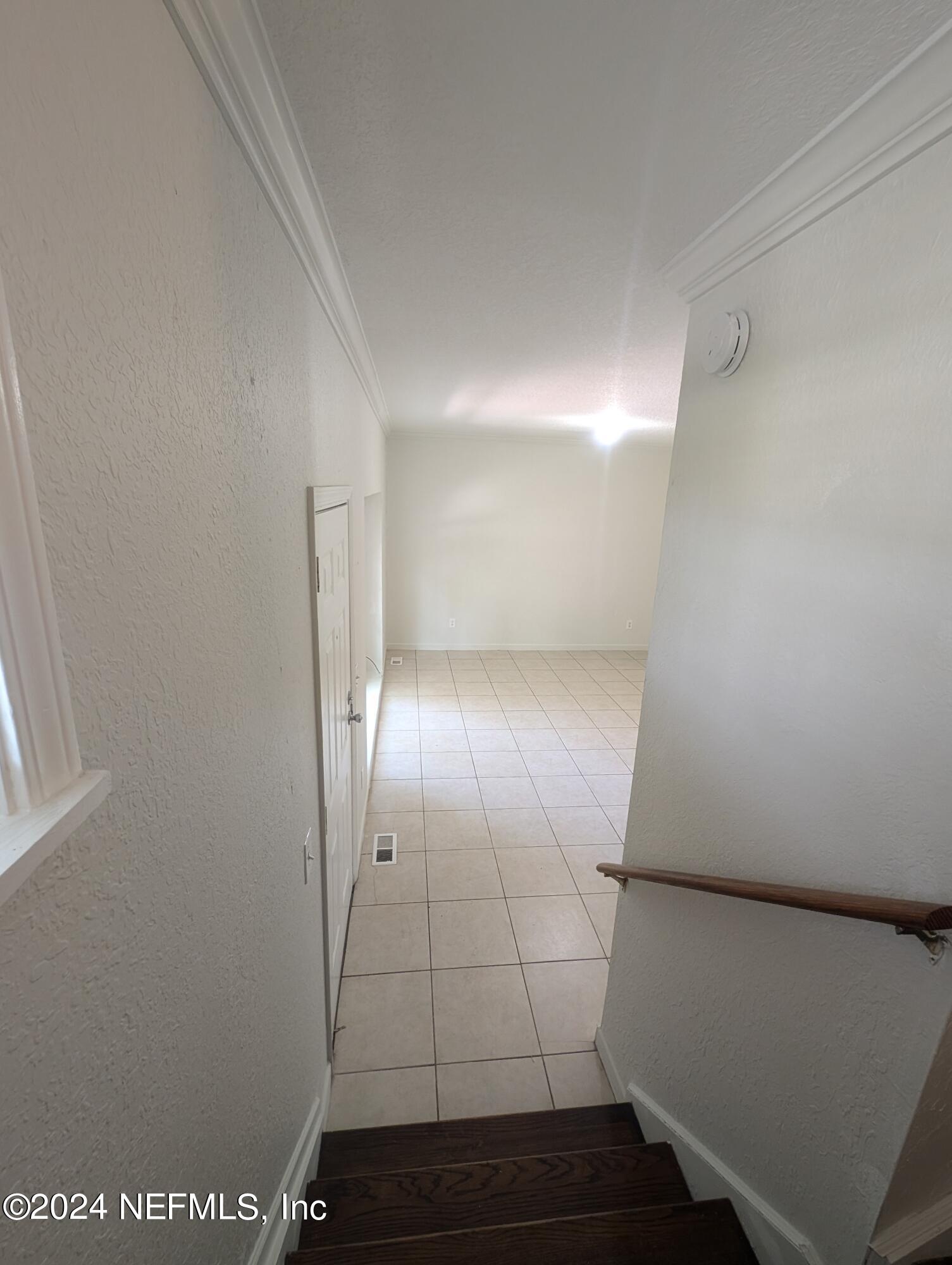 114 Cedar Street, Unit 8 St. Augustine, FL 32084 - Photo 33 of 39 a view of an empty room