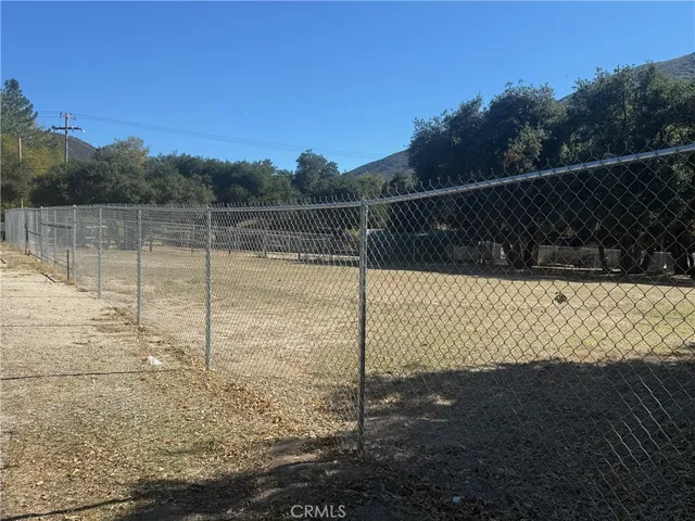 a view of a yard with an outdoor space
