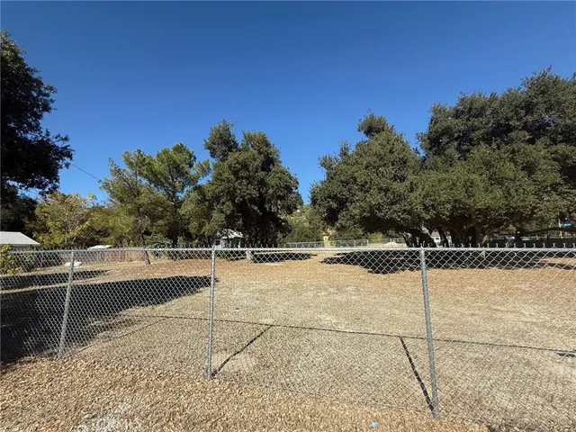 a view of a yard with an outdoor space