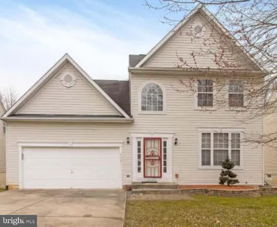 a view of a house with large windows