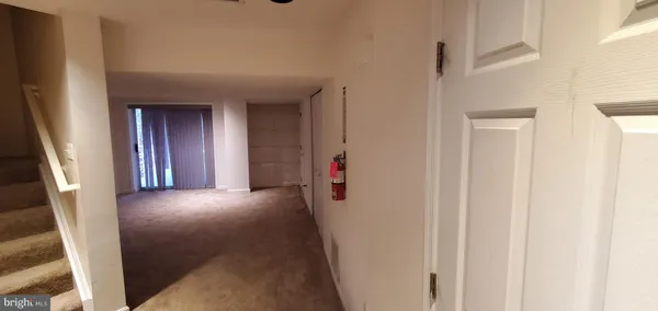 a view of hallway with stairs