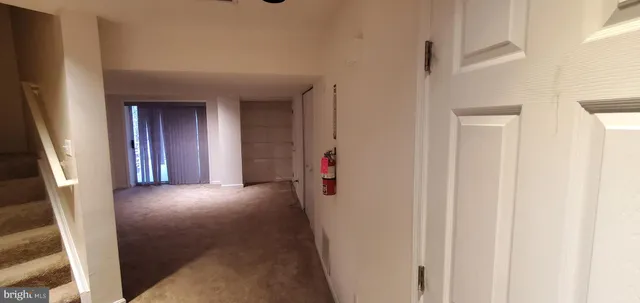 a view of hallway with stairs