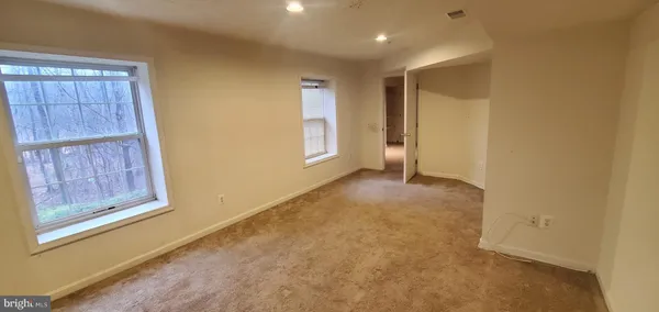 a bathroom with a shower and a toilet