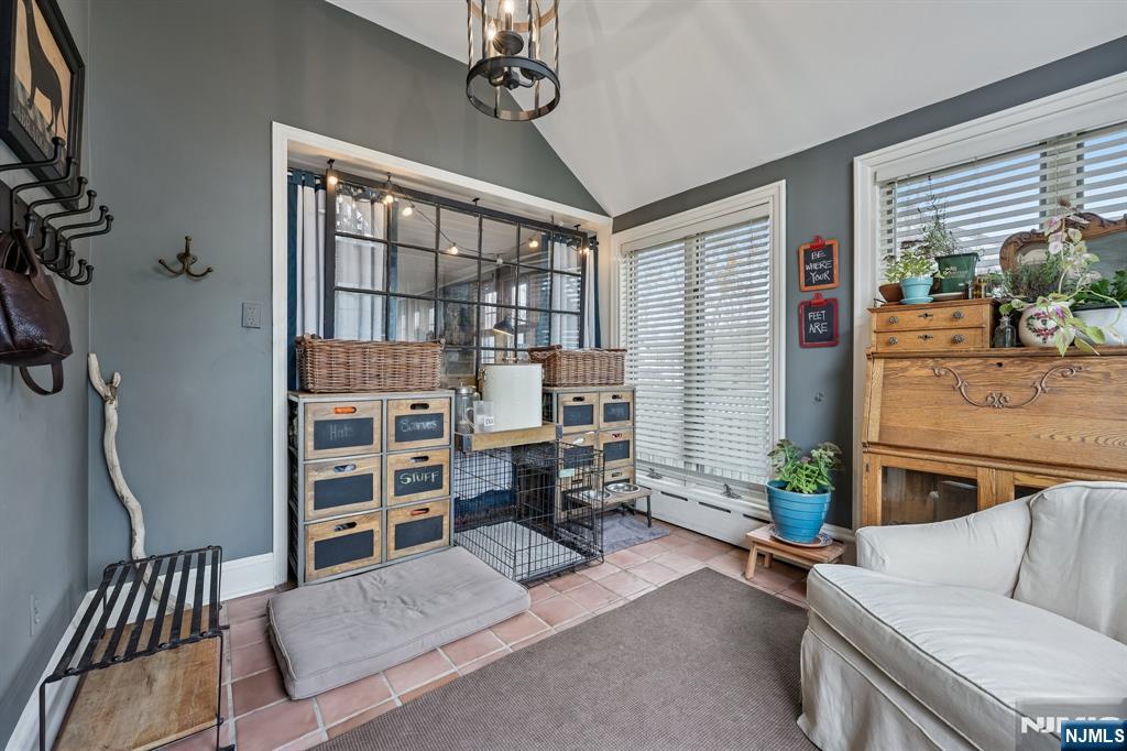 54 Joyce Road Tenafly, NJ 07670 - Photo 16 of 35 a living room with furniture and a window
