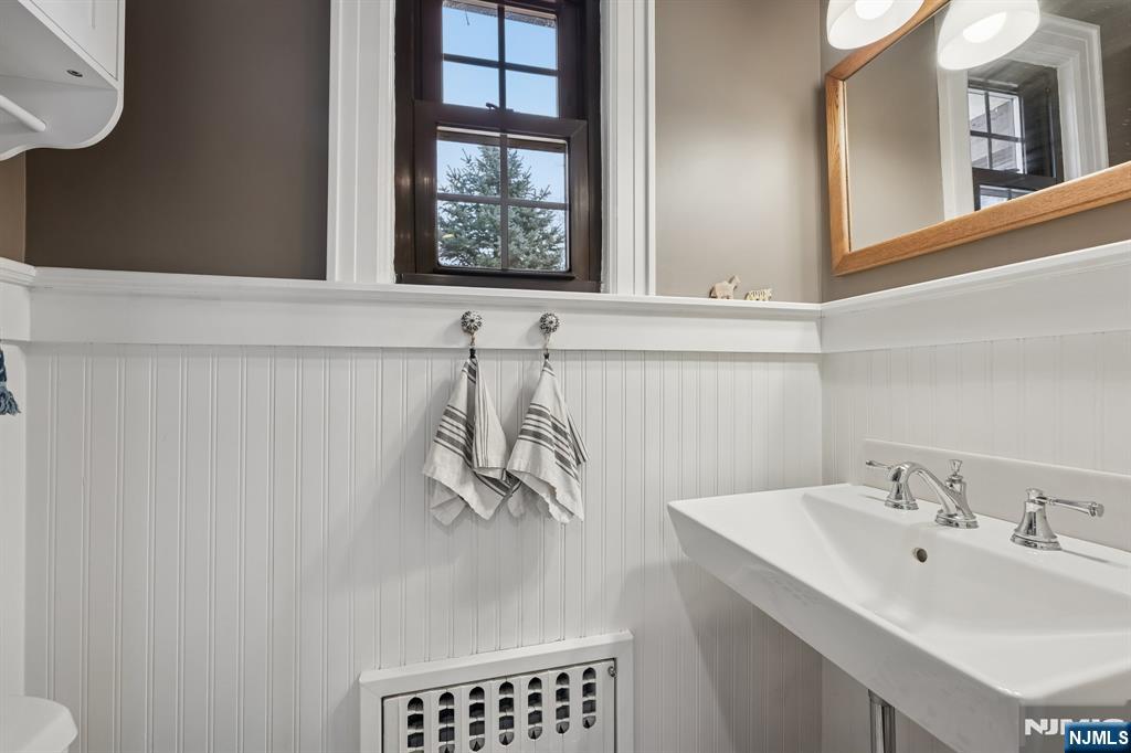 54 Joyce Road Tenafly, NJ 07670 - Photo 17 of 35 a bathroom with a sink and a window