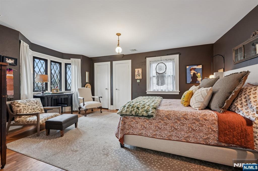 54 Joyce Road Tenafly, NJ 07670 - Photo 22 of 35 a bedroom with a bed couch and a window