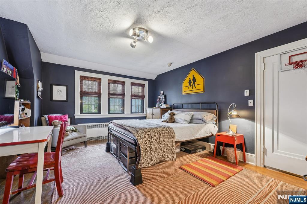 54 Joyce Road Tenafly, NJ 07670 - Photo 26 of 35 a bed room with bed and window