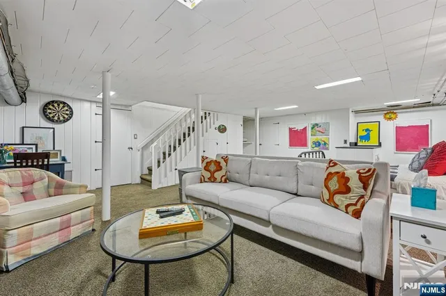 a living room with furniture and a table