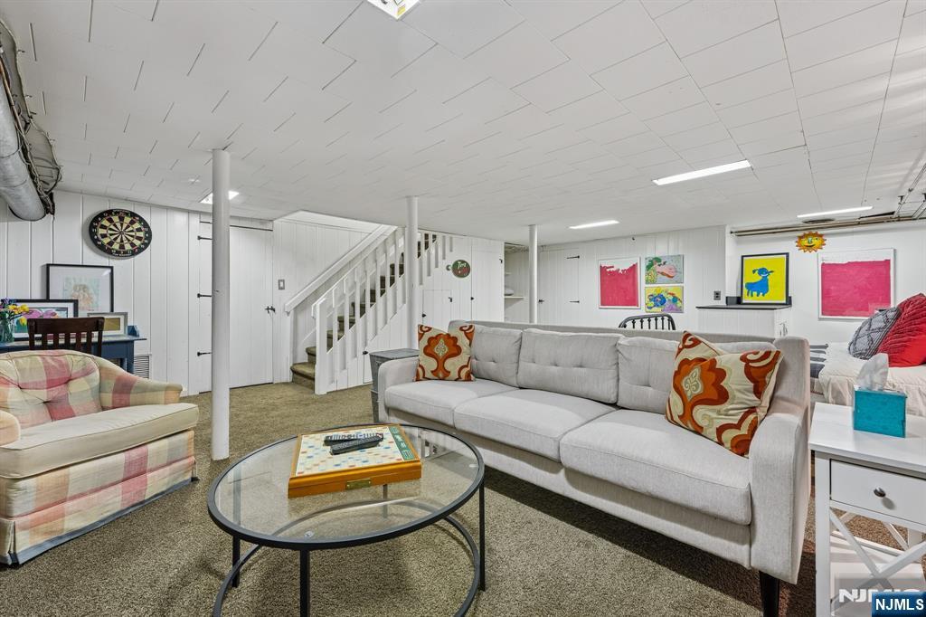 54 Joyce Road Tenafly, NJ 07670 - Photo 31 of 35 a living room with furniture and a table