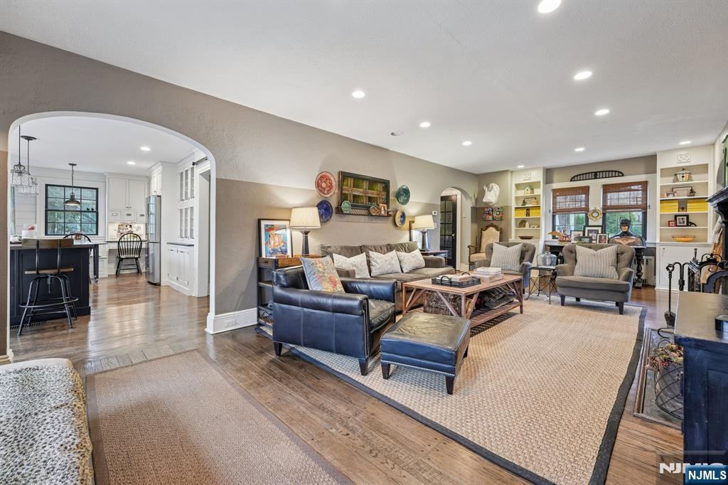 54 Joyce Road Tenafly, NJ 07670 - Photo 6 of 35 a living room with furniture and a table