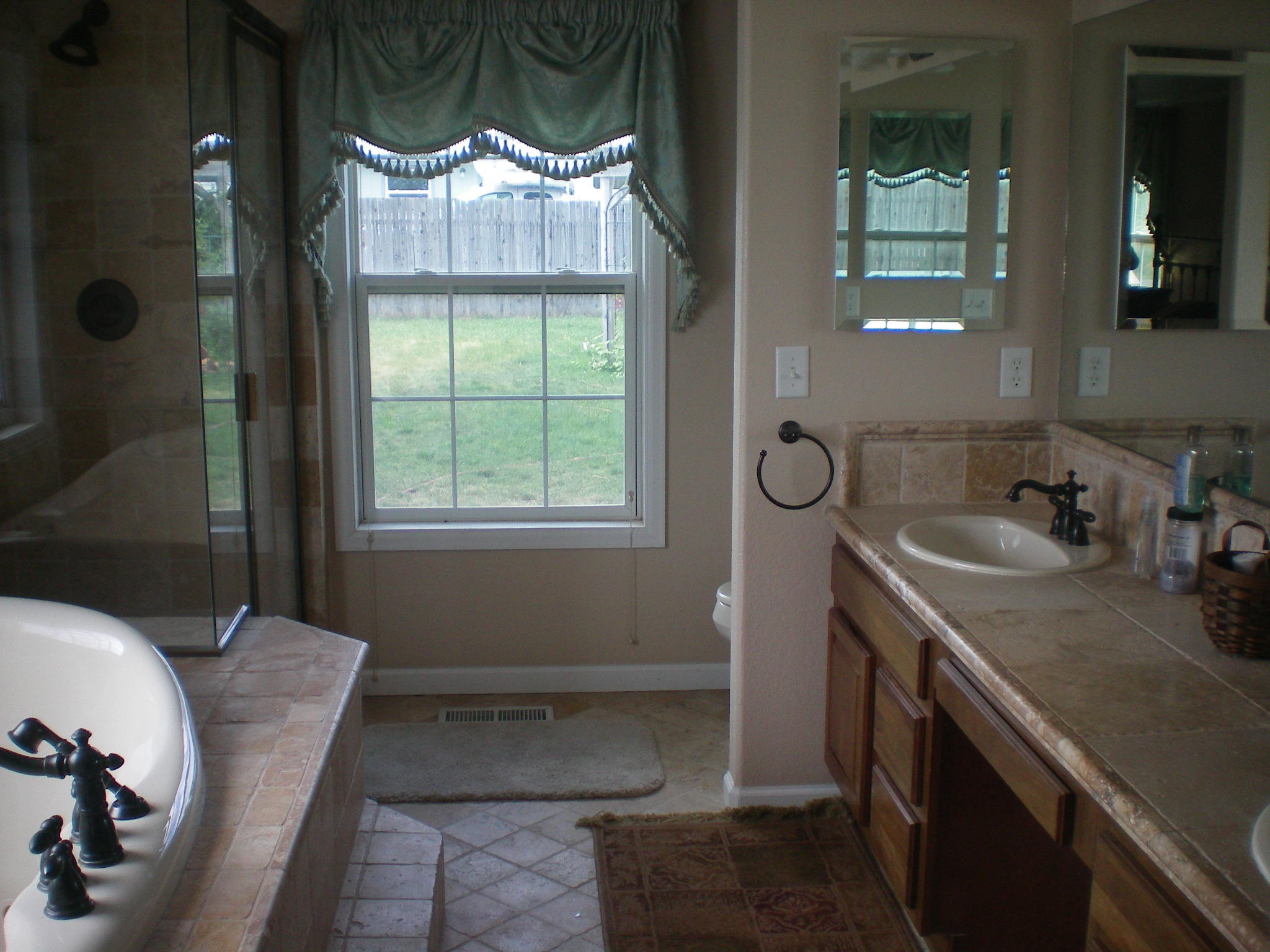 35414 II10 Road Redvale, CO 81431 - Photo 5 of 19 a bathroom with a sink a mirror and a window