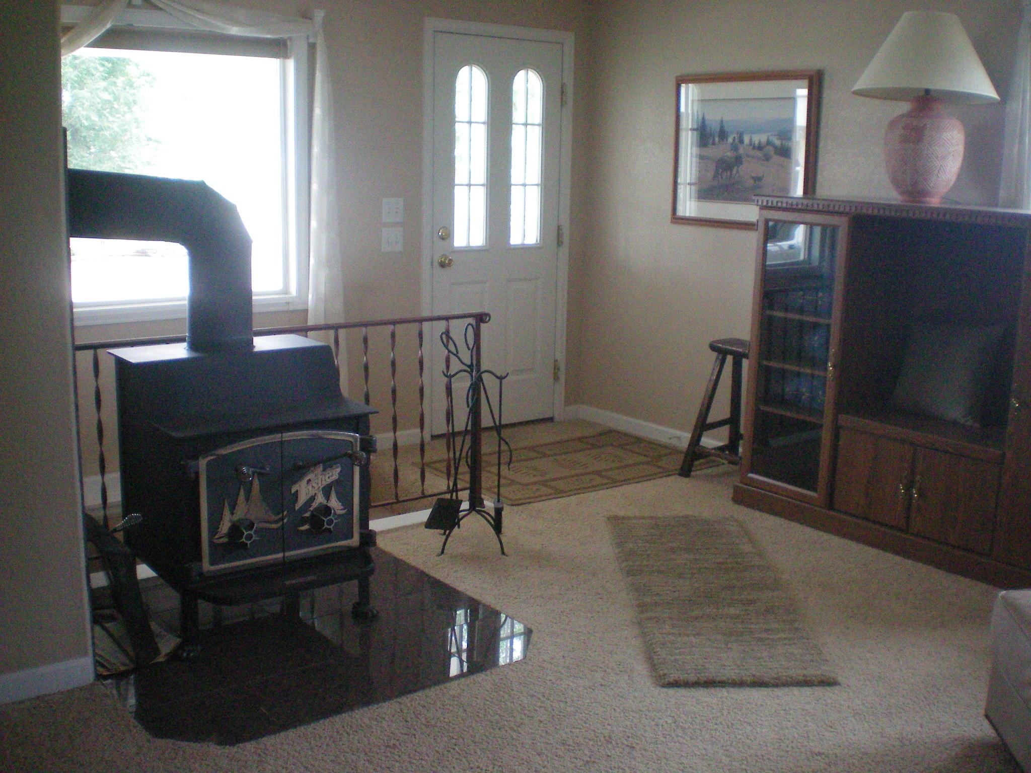 35414 II10 Road Redvale, CO 81431 - Photo 8 of 19 a living room with furniture and a fireplace