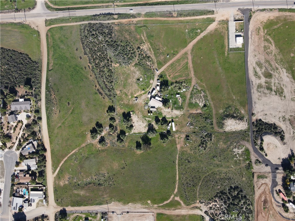 25099 Bundy Canyon Road Menifee, CA 92584 - Photo 4 of 16 a bathroom with a shower