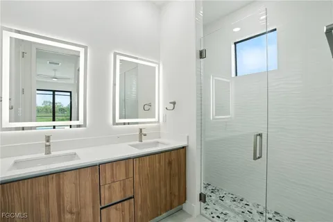 a view of cabinets and wooden floor