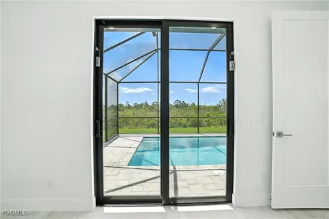 a view of a livingroom with stairs and garage