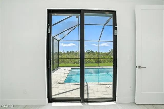a view of a livingroom with stairs and garage